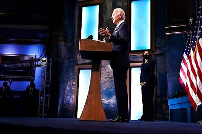 The Latest: Pfizer Says It's Communicating With Biden's Team