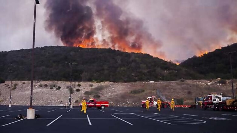Thousands flee Southern California wildfires, university evacuated