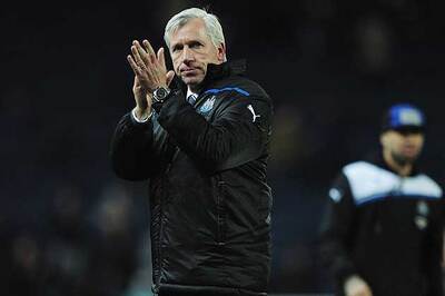 Alan Pardew banned for push on official