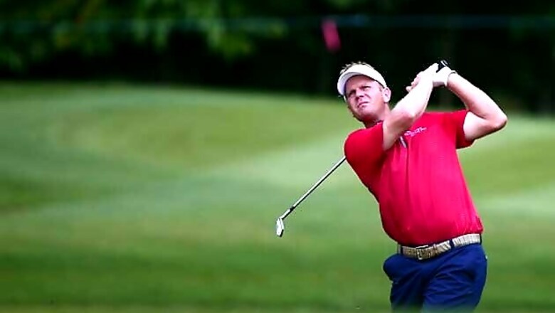 Billy Hurley takes a two-shot lead at CIMB Classic