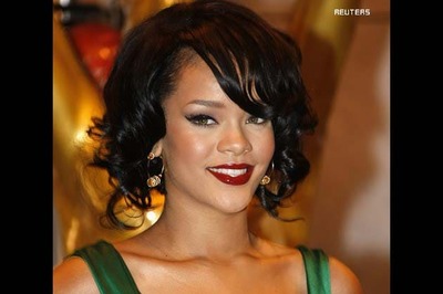 Rihanna shows it all in a lace dress