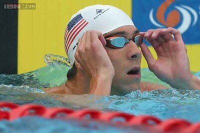 Michael Phelps impresses in first international comeback race