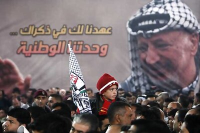 Palestinian leader Yasser Arafat's body exhumed