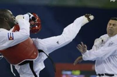 Cuban ex-champ expelled for kicking referee