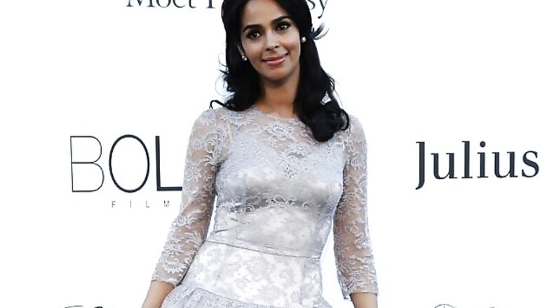 Hot or Not: Mallika Sherawat wears a lace gown at Cannes red carpet