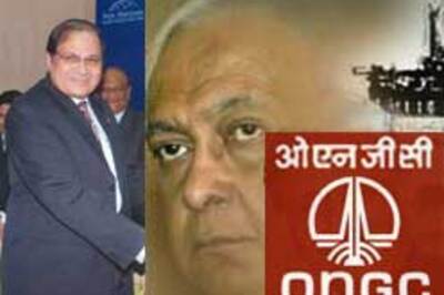 Raha passes ONGC baton to Sharma