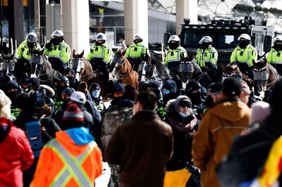 'O Canada': Ottawa Police Inch Back Covid Mandate Protesters After Hours-long Standoff