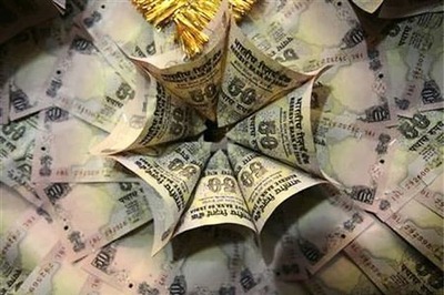 Rupee hits record low; Pranab seeks austerity