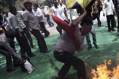 Tibetan sets himself on fire at anti-China protest