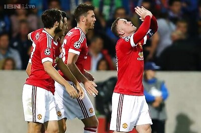 Wayne Rooney nets hat-trick as Manchester United qualify for Champions League