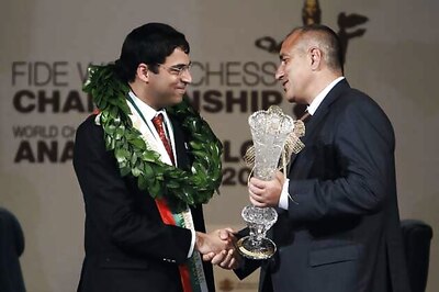 Anand receives championship medal, prize money