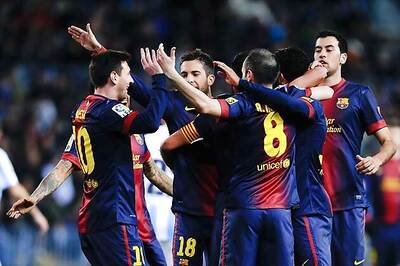 10-man Malaga hold Barcelona 2-2 in Copa del Rey