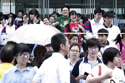 China says 127 students hired others for taking their exam