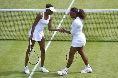 Two doubles wins in a day for Williams sisters