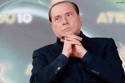 Italy's Berlusconi hints open to alliance with center-left