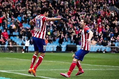Atletico pressure Real Madrid with 2-0 win at Betis