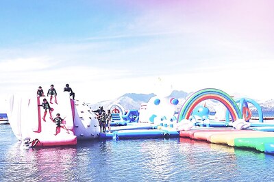 Inflatable, Floating Island Includes Unicorns, Dinosaurs, And Millennials; See Pics