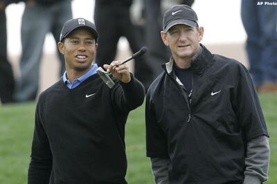 Tiger Wood's swing coach resigns