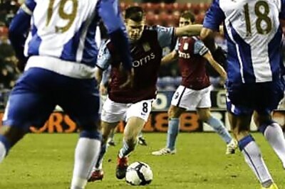 Milner gives Aston Villa a 2-1 win over Wigan