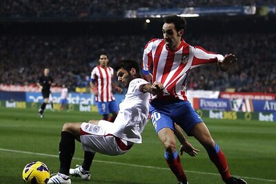 Atletico Madrid rout 9-man Sevilla 4-0 in La Liga