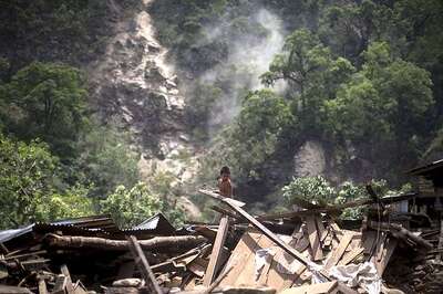Landslide triggered by heavy rainfall buries 6 villages in northeast Nepal