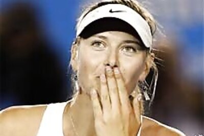 Sharapova ends Henin's 32-match winning streak