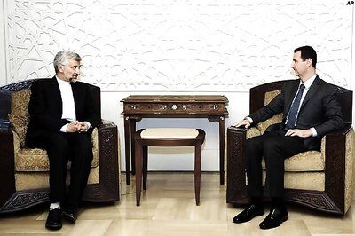 Assad returns to public eye with ally Iran