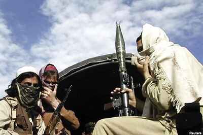 Multiple Taliban raids kill 26 Afghan police or troops