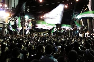 Syrian opposition vows protest to test shaky truce