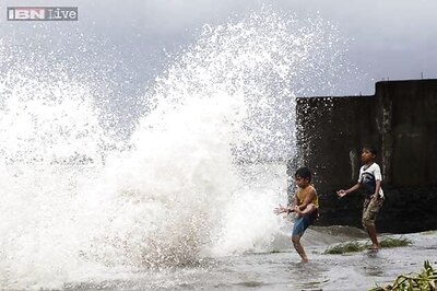 Massive destruction as typhoon kills at least 1,200 in Philippines