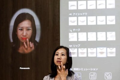 A ping pong robot, magic mirror that doesn't really lie, and flying origami bird: Weird tech unveiled at Asia's largest electronics fair