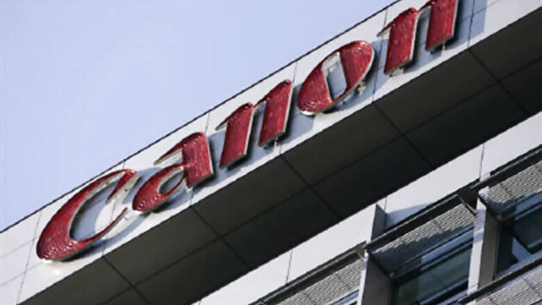 Canon hikes DSLR camera prices, to miss growth target for 2013