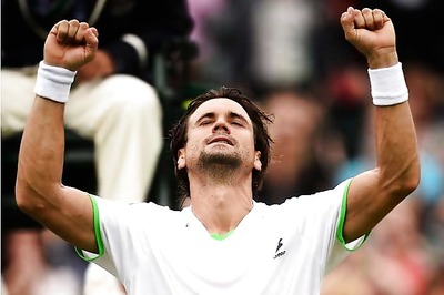 Ferrer grinds down Dodig to reach Wimbledon quarter-finals