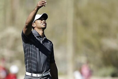 Tiger exits Match Play as McIlroy progresses