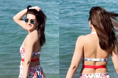 Learn To Layer From Kriti Sanon, Who Rocked A Cream Dress Over Neon Bikini