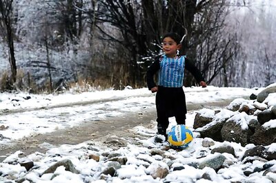 Pictures of an Afghan boy wearing plastic Messi jersey make waves on net