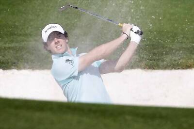 Rory McIlroy shoots 63 to take lead in Dubai