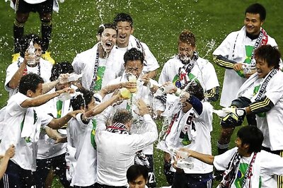 Japan become first team to reach 2014 football World Cup