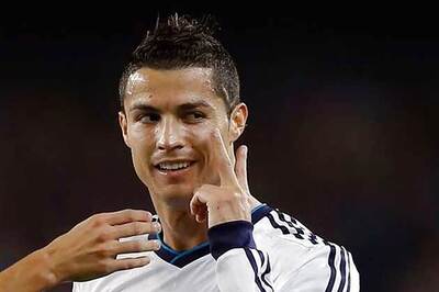 Messi, Ronaldo shine as Barca-Real tie ends in a draw