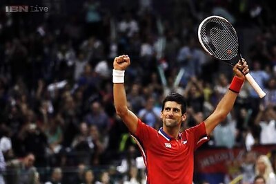 Djokovic downs Federer in three sets at ATP Finals