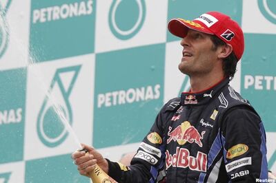 Webber gets a new Red Bull deal for 2011