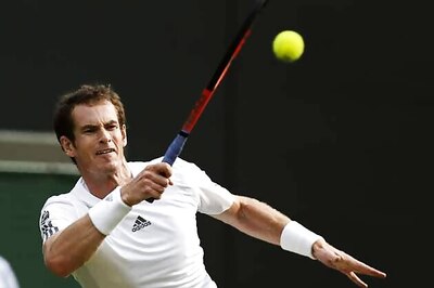 Andy Murray wins to keep British happy at Wimbledon