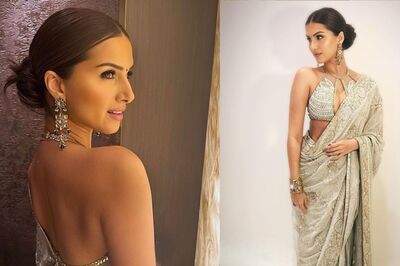 Tara Sutaria Shines Like a Star in Faabiiana's Silver Embroidered Saree and Halter Blouse