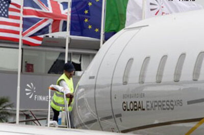 Rain matches gloom at Paris Air Show