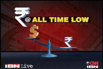 Rupee hits record low; exporter dollar sales eyed