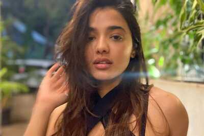 Ketika Sharma Looks Stunning In Black Halter Neck Top And White Pants