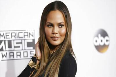 Chrissy Teigen Hits Back At Trolls Over Breastfeeding Photo