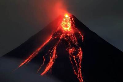 Displaced Filipinos Brace for Long Wait As Fiery Mayon Rumbles on
