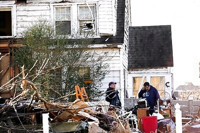 Tornado Victims Find Scraps As They Sift Through Destruction