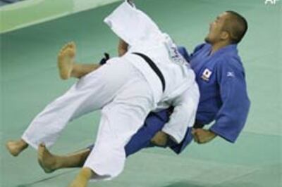 Judo king Suzuki loses in 100kg first round